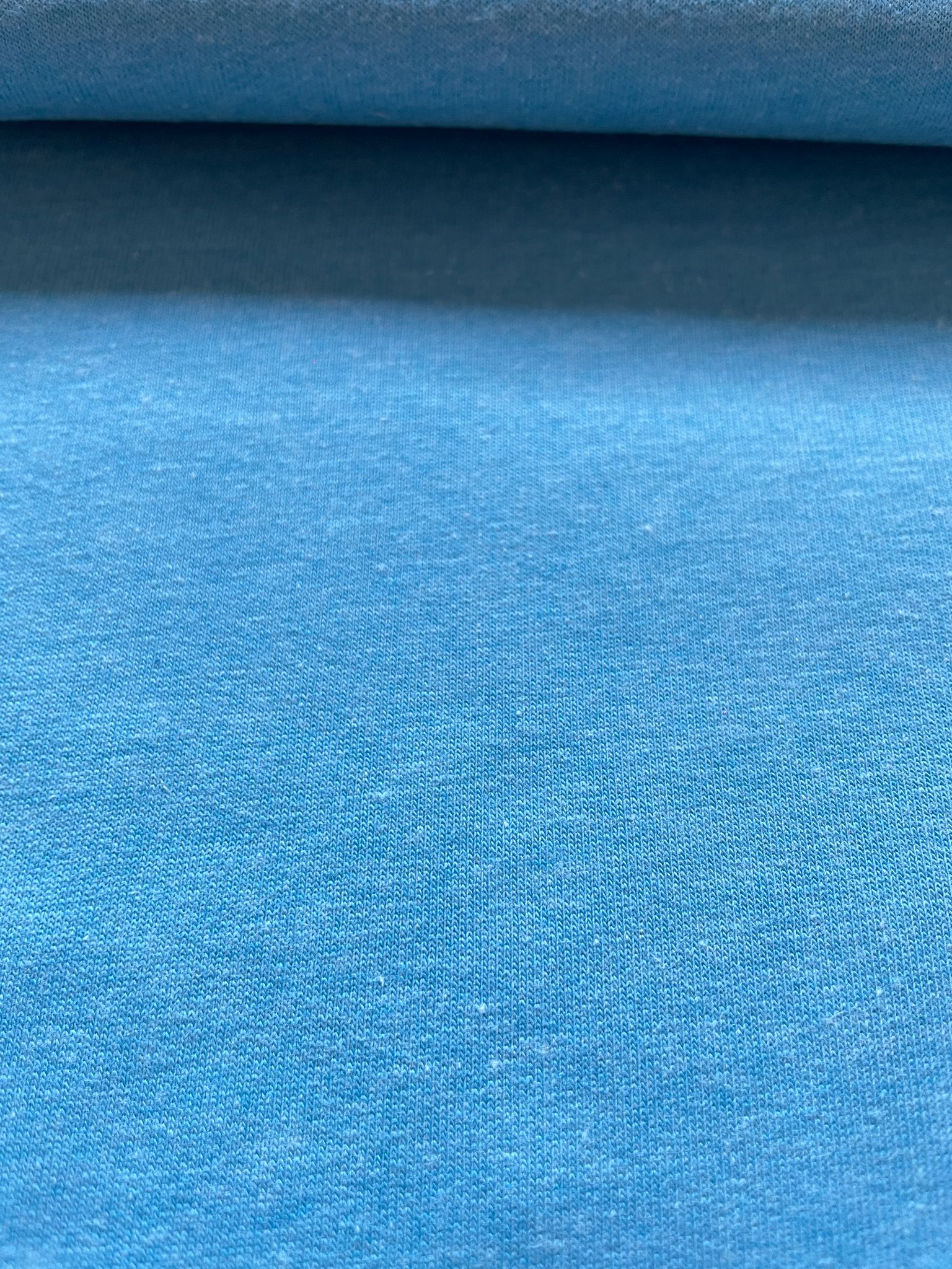 French Terry türkis melliert uni
