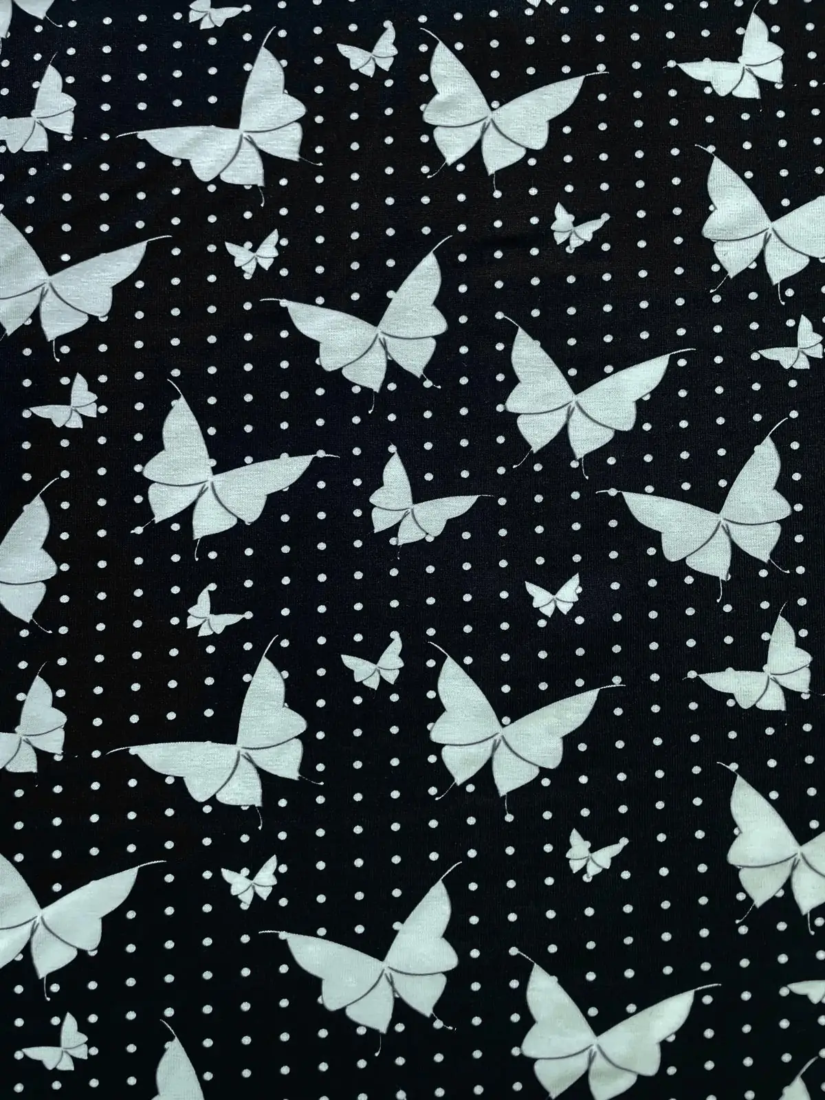 Baumwolljersey "Butterfly Magic“ – Zeitloses Design in Schwarz 