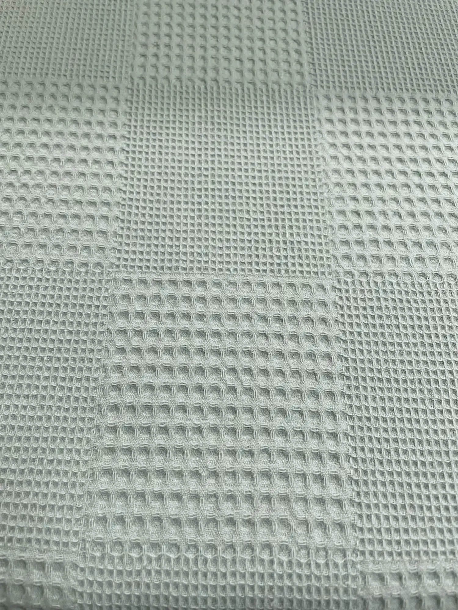 Waffeljersey in Mintgrün mit großem Karomuster – strukturierte Meterware für Handtücher und Babykleidung