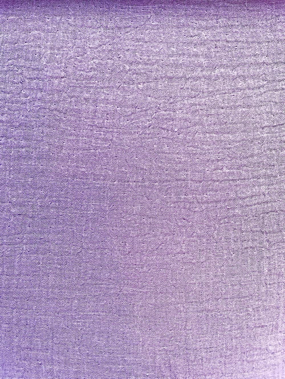 Weicher Musselin in Lila/Flieder, ideal für luftige Babykleidung, Tücher und Sommeroutfits – 135g/m² Qualität.