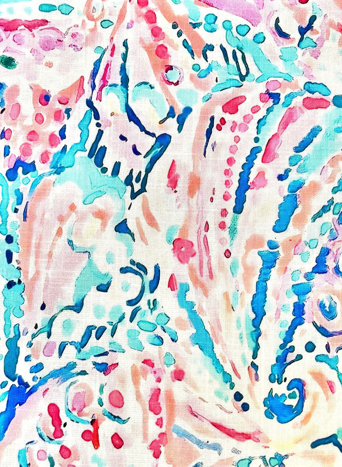 Hochwertiger, stretchig-weicher Viskosestoff mit einem lebhaften, abstrakten Muster aus Punkten und Linien in Türkis, Koralle, Pink und Blau auf hellem Hintergrund.