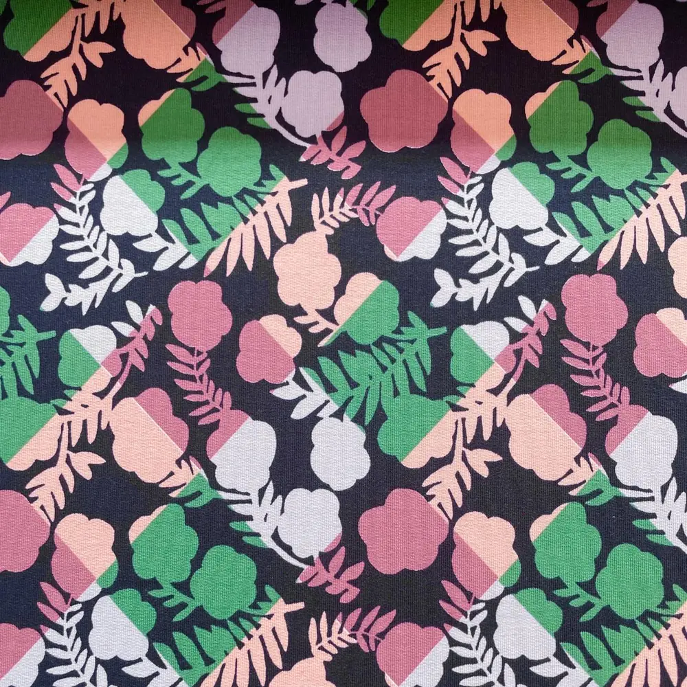 French Terry "Blütengeometrie" Rautenmuster Blumen