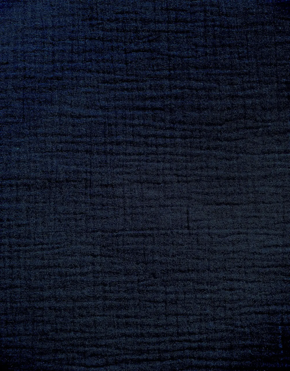 Strukturaufnahme von dunkelblauem Musselin-Stoff aus 100% Baumwolle für Bekleidung