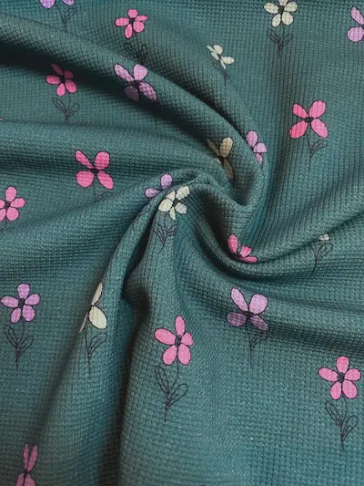 Waffel-Jersey Stoff petrol / bunte Blumen Waffel-Jersey Stoff petrol / bunte Blumen
