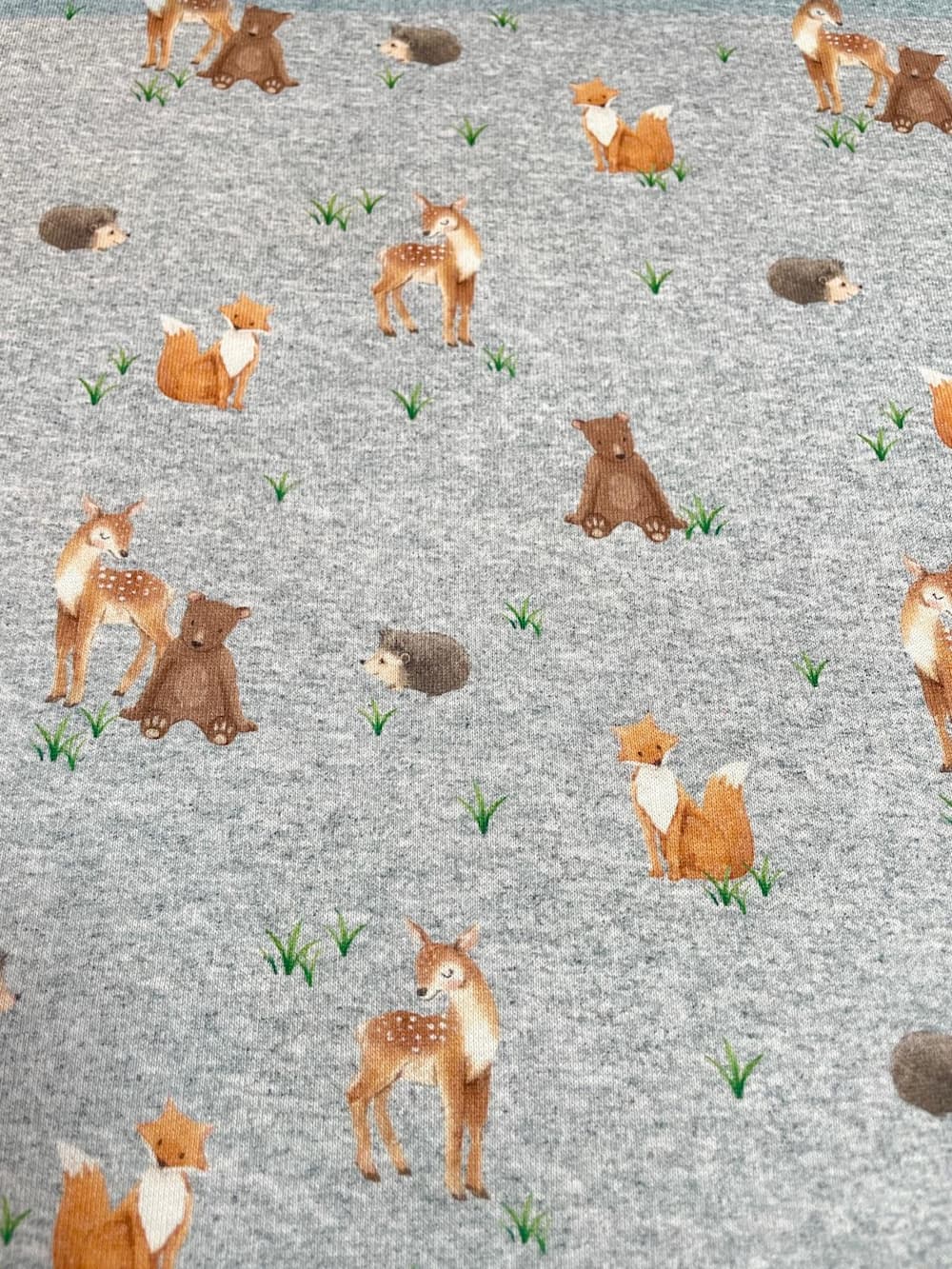 Alpenfleece "Waldtiere auf Melange" grau 