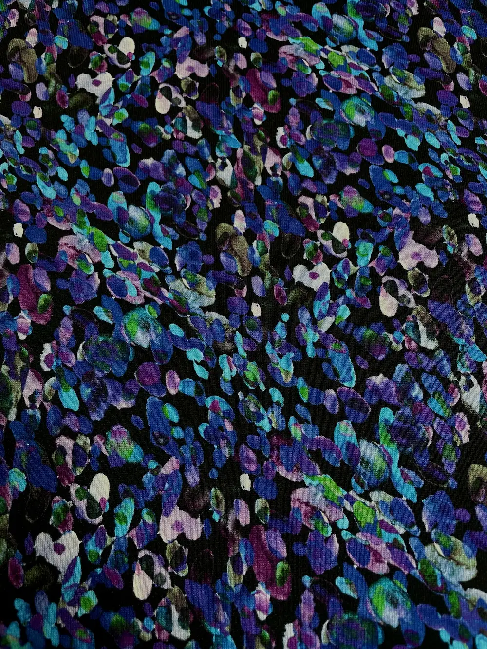 Alpenfleece Leo Print lila / türkis / violett/ schwarz