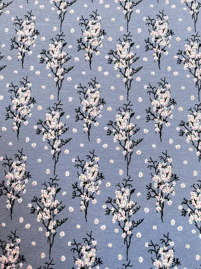 Viskose Jersey "Spring Blossom" blaulila mit Kirschbaumblüten Viskose Jersey "Spring Blossom" blaulila mit Kirschbaumblüten