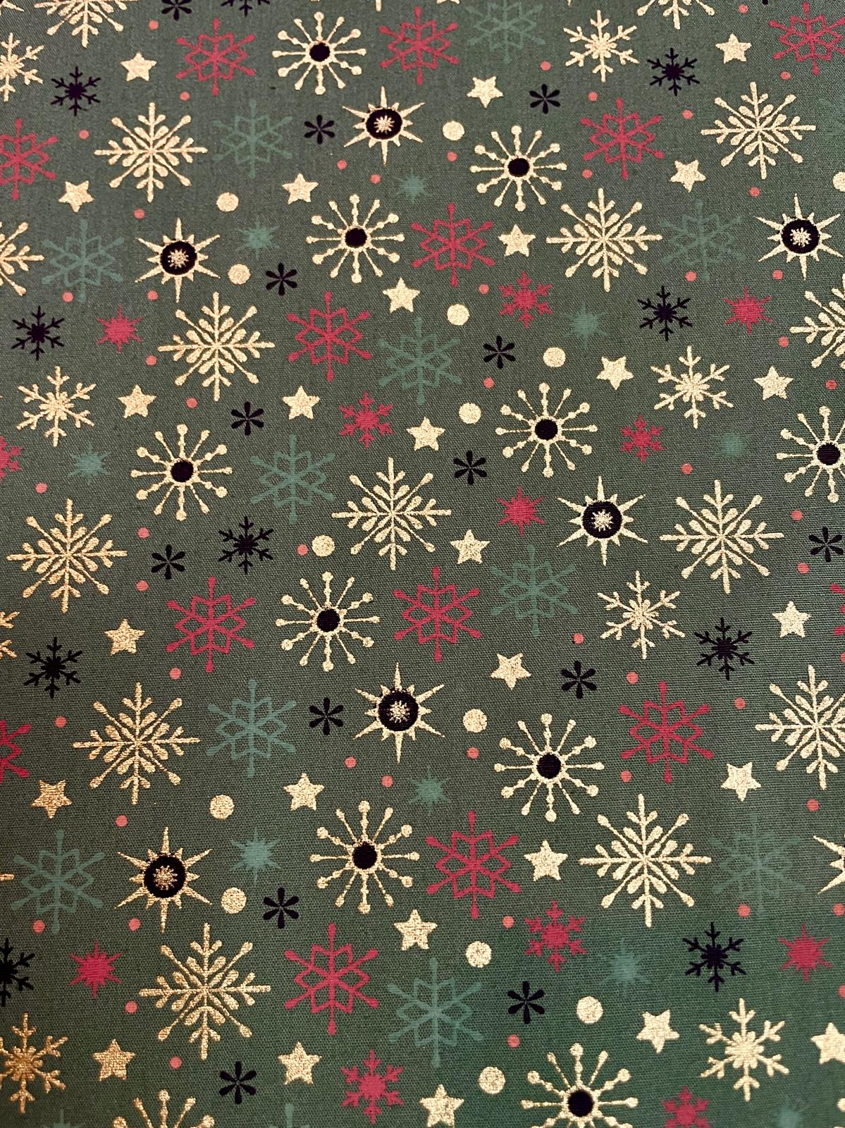 Baumwolle Weihnachten grün mit bunten Schneeflocken