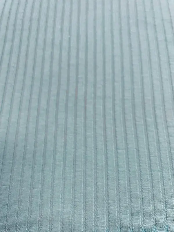 Breit gerippter Jersey in Blaugrün – elastischer Strukturstoff für Shirts, Leggings und modische Kleidung
