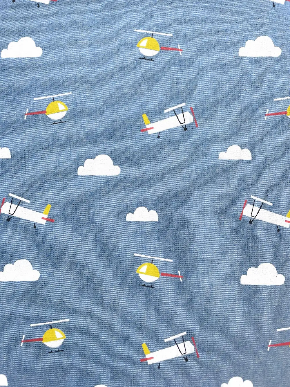 Jeans Stoff "Up in the Air" fein blau mit Hubschraubern