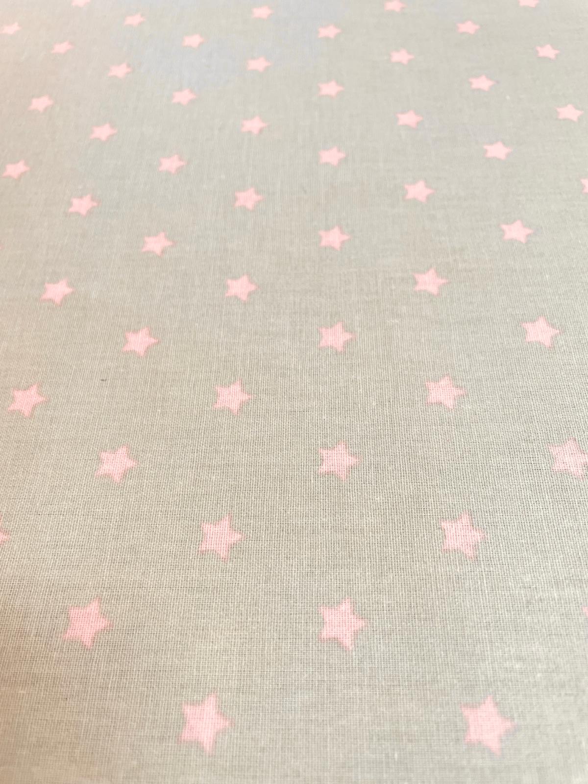 Beschichtete Baumwolle "Rosé Star" beige mit rosa Sternen