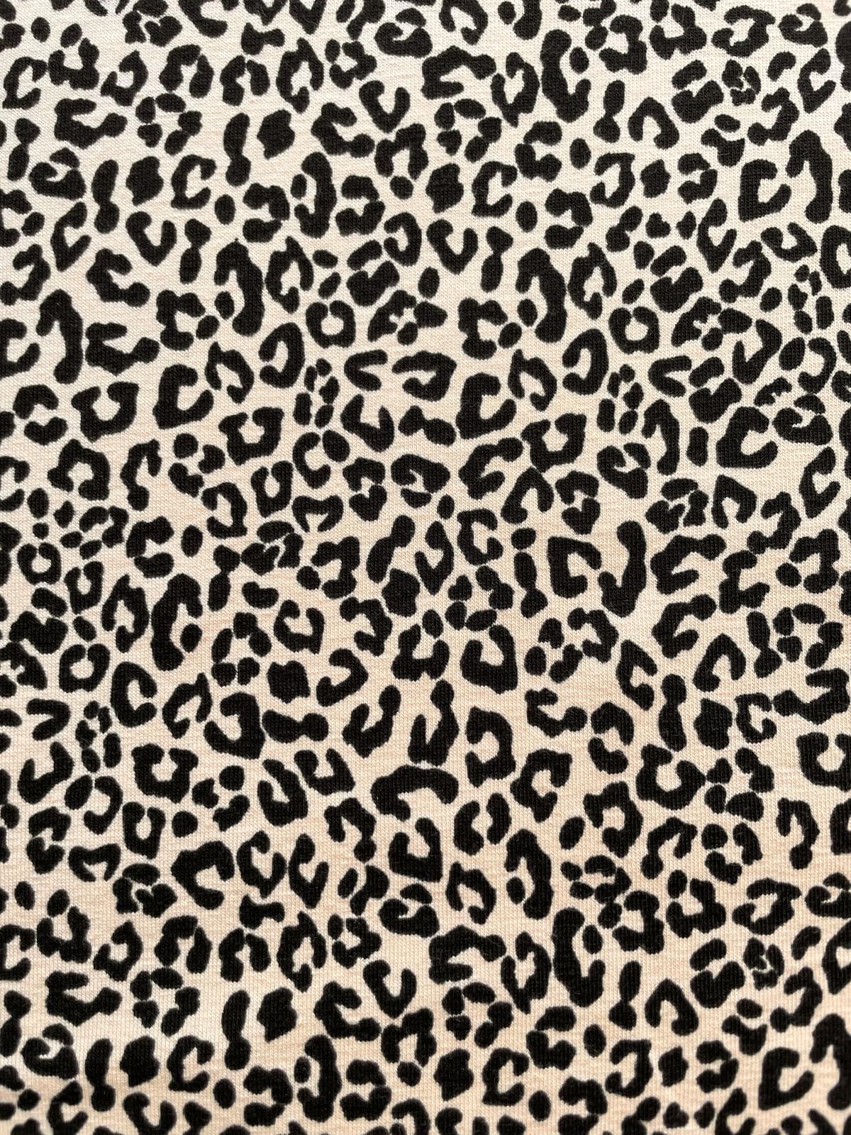 Baumwolljersey Stoff als Meterware mit Leopardenmuster in Beige und Schwarz